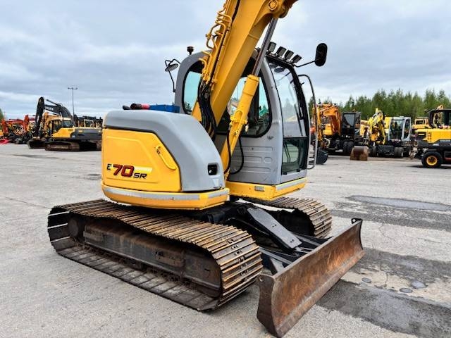 new-holland-e-70-myyty-sold,0502ac1c