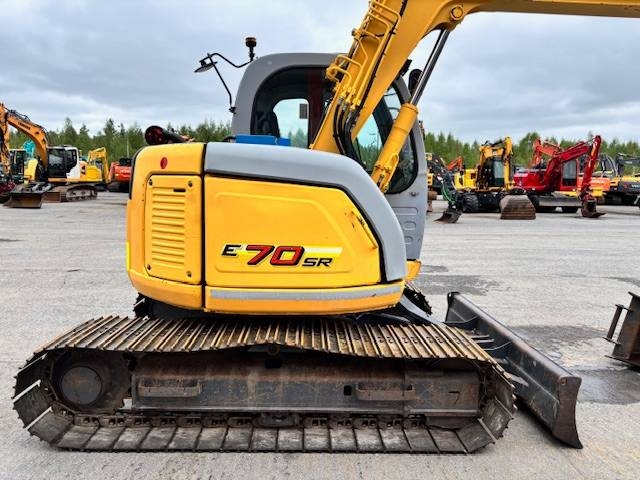 new-holland-e-70-myyty-sold,6c537a43