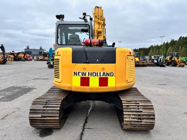 new-holland-e-70-myyty-sold,73e70c68