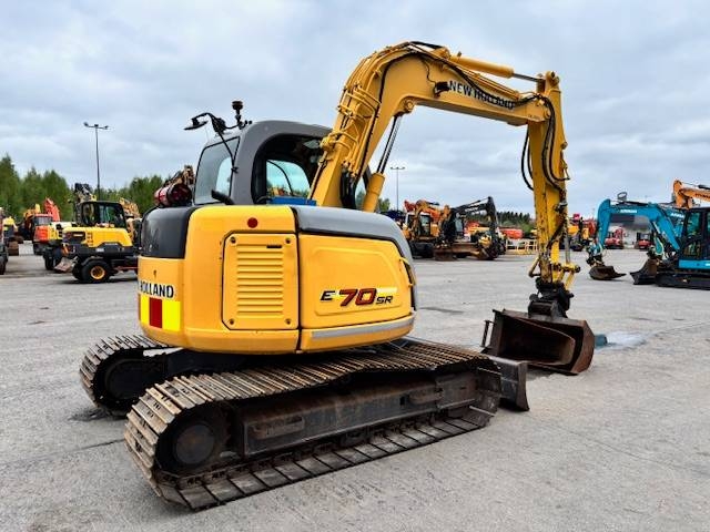 new-holland-e-70-myyty-sold,94eb4bac