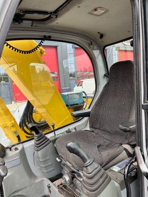 new-holland-e-70-myyty-sold,9f0d1ab6