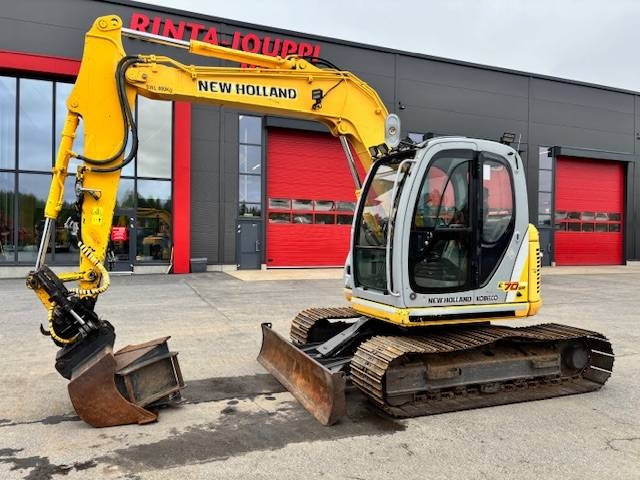 new-holland-e-70-myyty-sold,e3b7efee