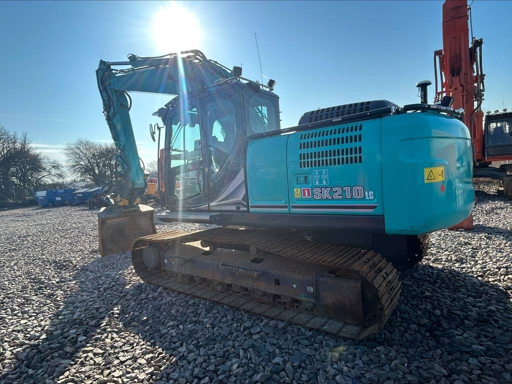 Kobelco SK210LC, Bandgrävare, Entreprenad