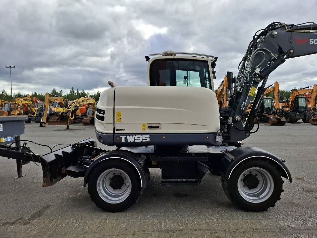 schaeff-tw95-engcon-karry-2-ka,531e4cd7