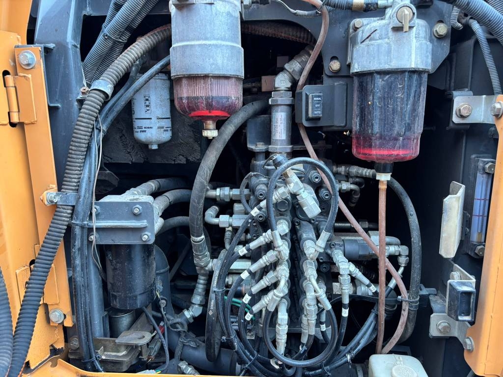 case-cx-75-engcon-5-tyolaitett,a72af25f