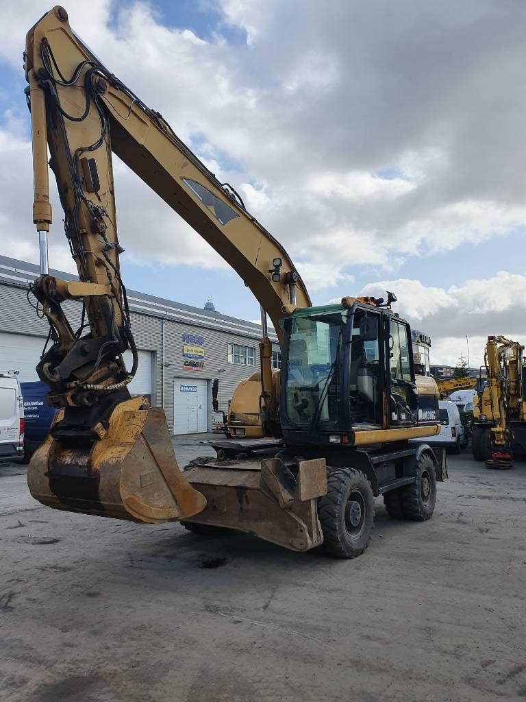Caterpillar M 316 C, Pelle sur pneus, Travaux Publics