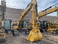 CAT 323, Excavadoras de cadenas, Construcción