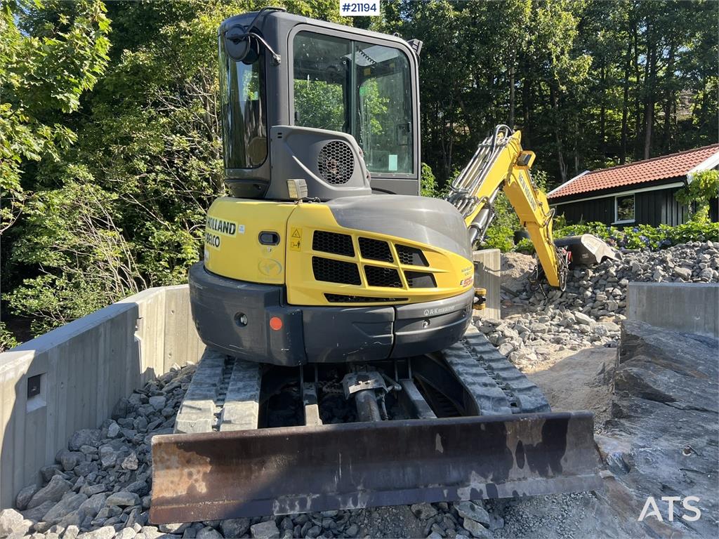 New Holland E55B excavator w/ digging bucket, sanding bucket,