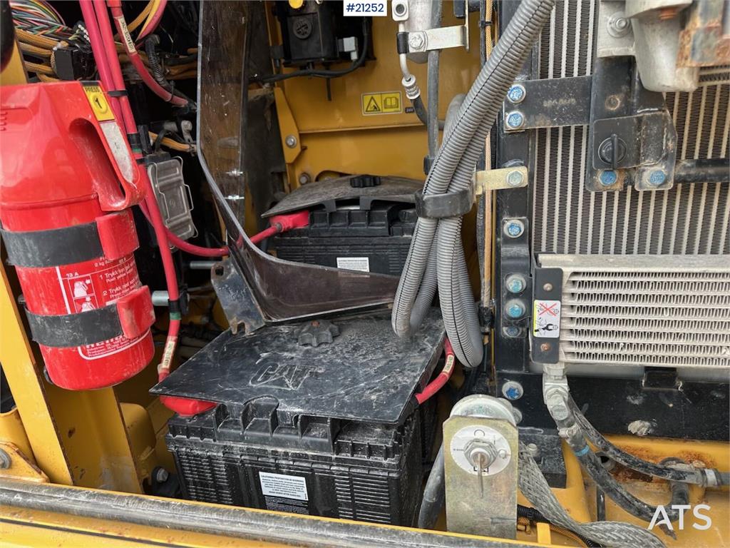 CAT 323E excavator w/ 3 buckets.
