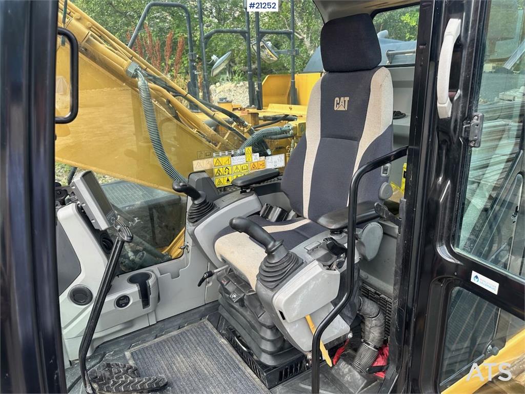 CAT 323E excavator w/ 3 buckets.