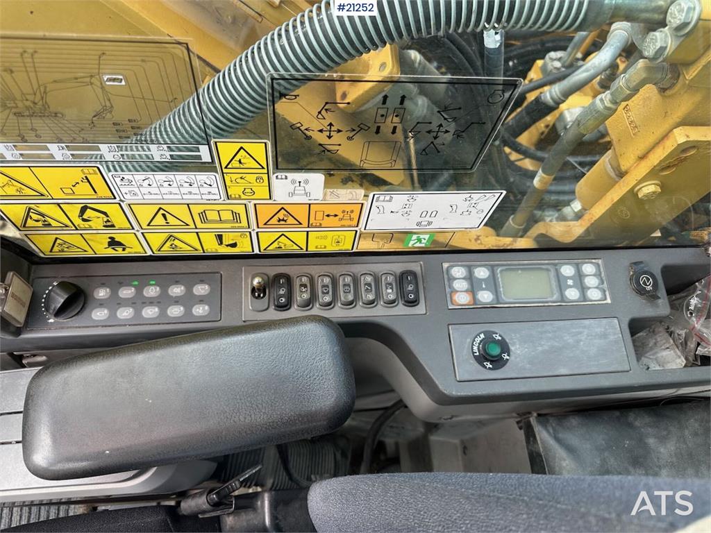 CAT 323E excavator w/ 3 buckets.