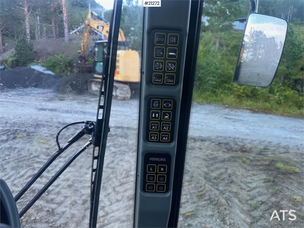 Hydrema 912GS dump truck w/white signs. WATCH VIDEO.