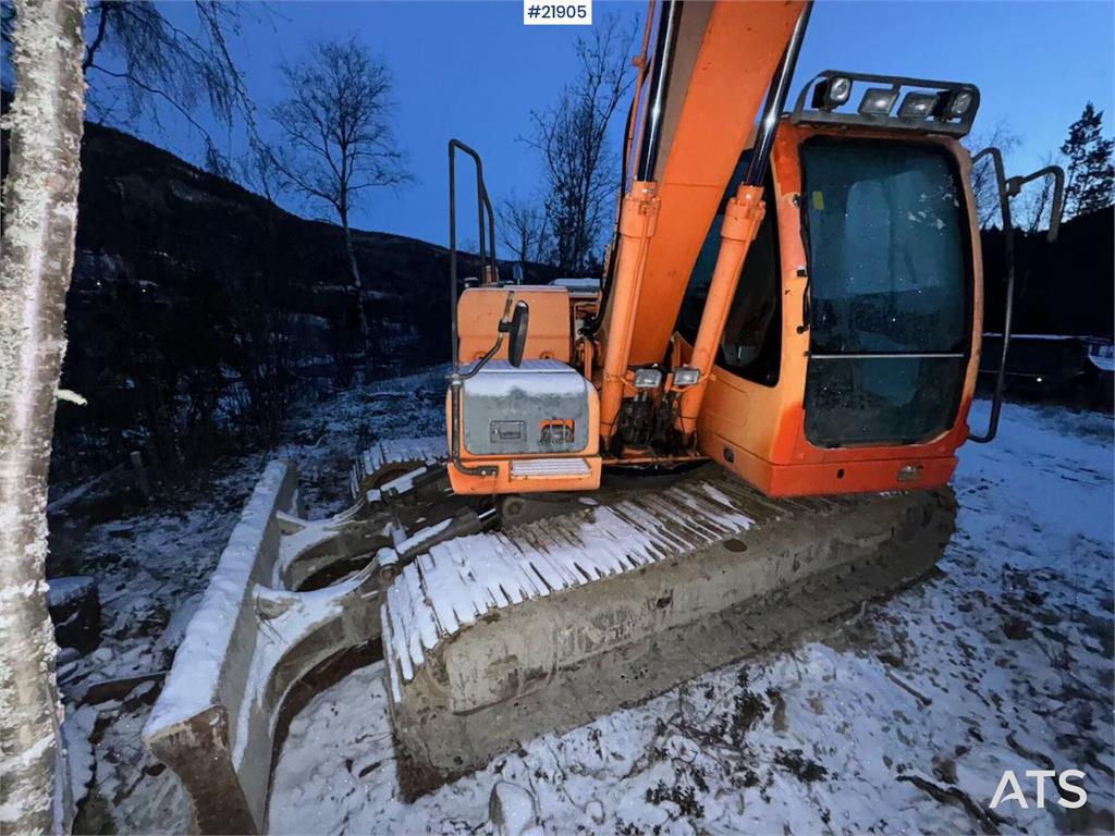 Doosan DX140LC tracked excavator with Engcon tilt and 2 b