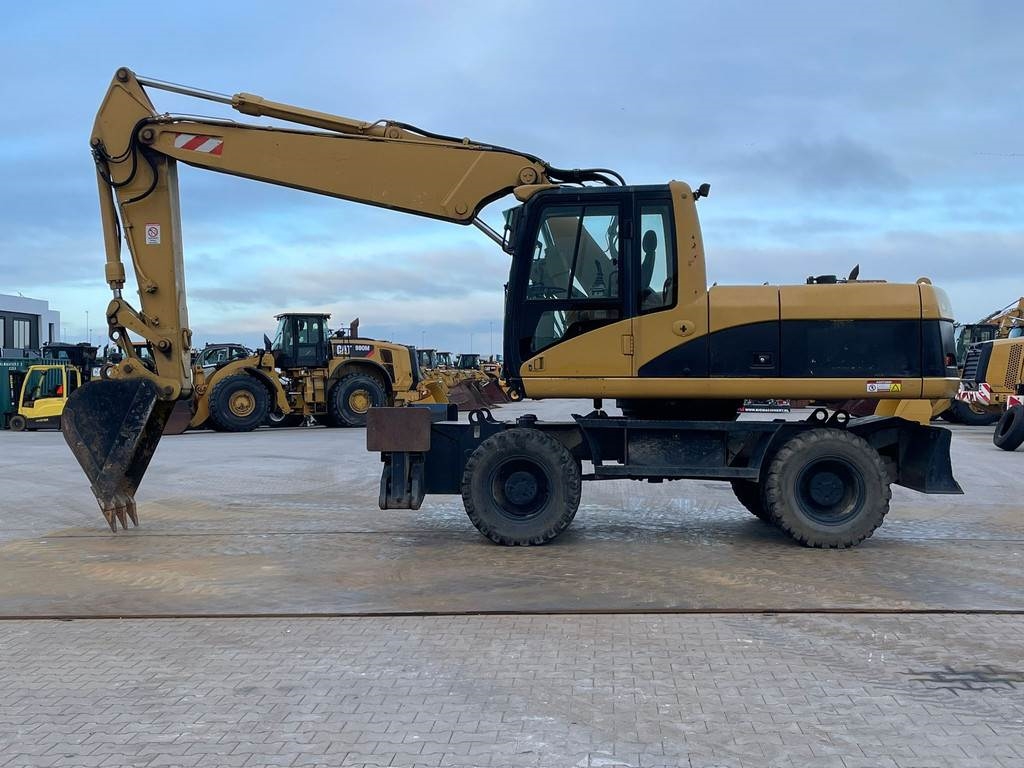 CAT M318C