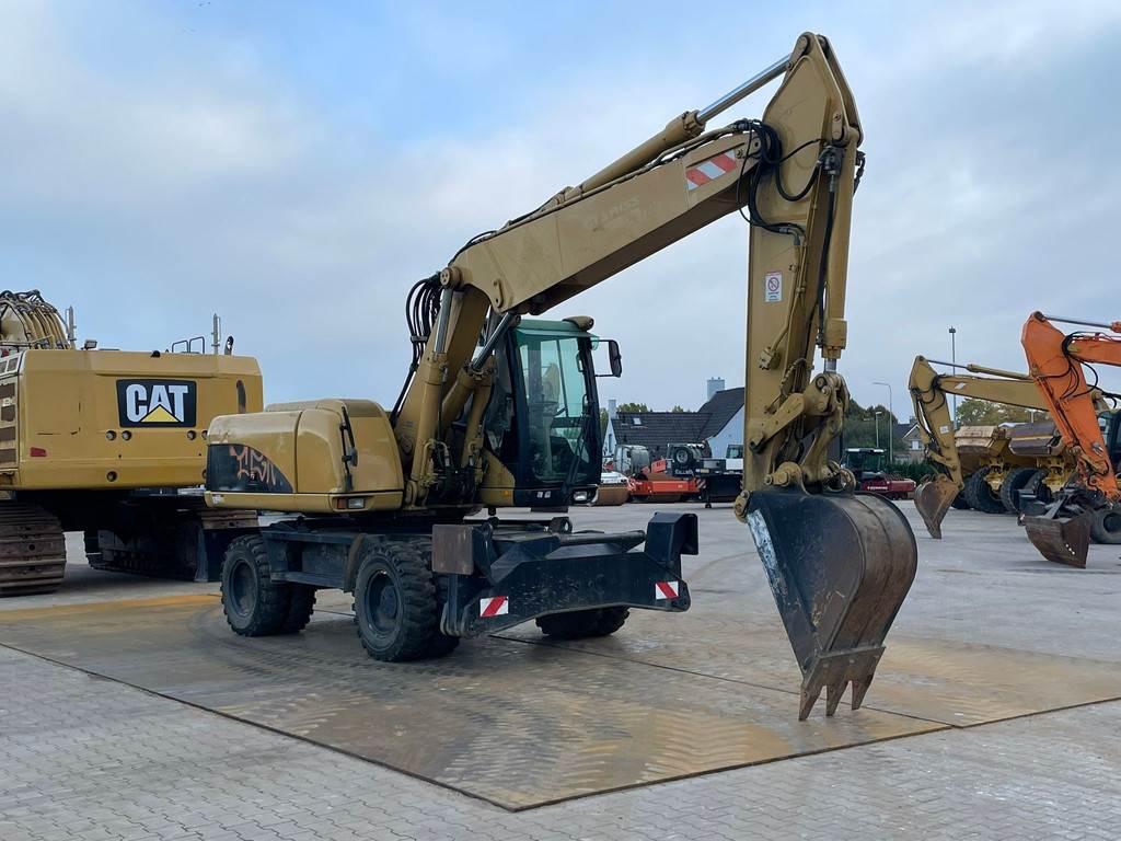 CAT M318C