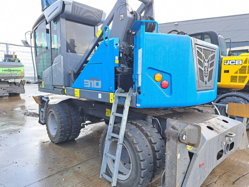 Fuchs MHL310F + Grapple