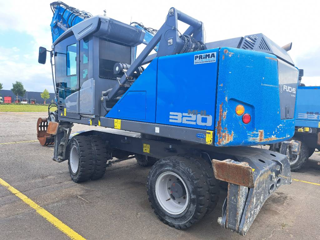 Fuchs MHL320F + Grapple