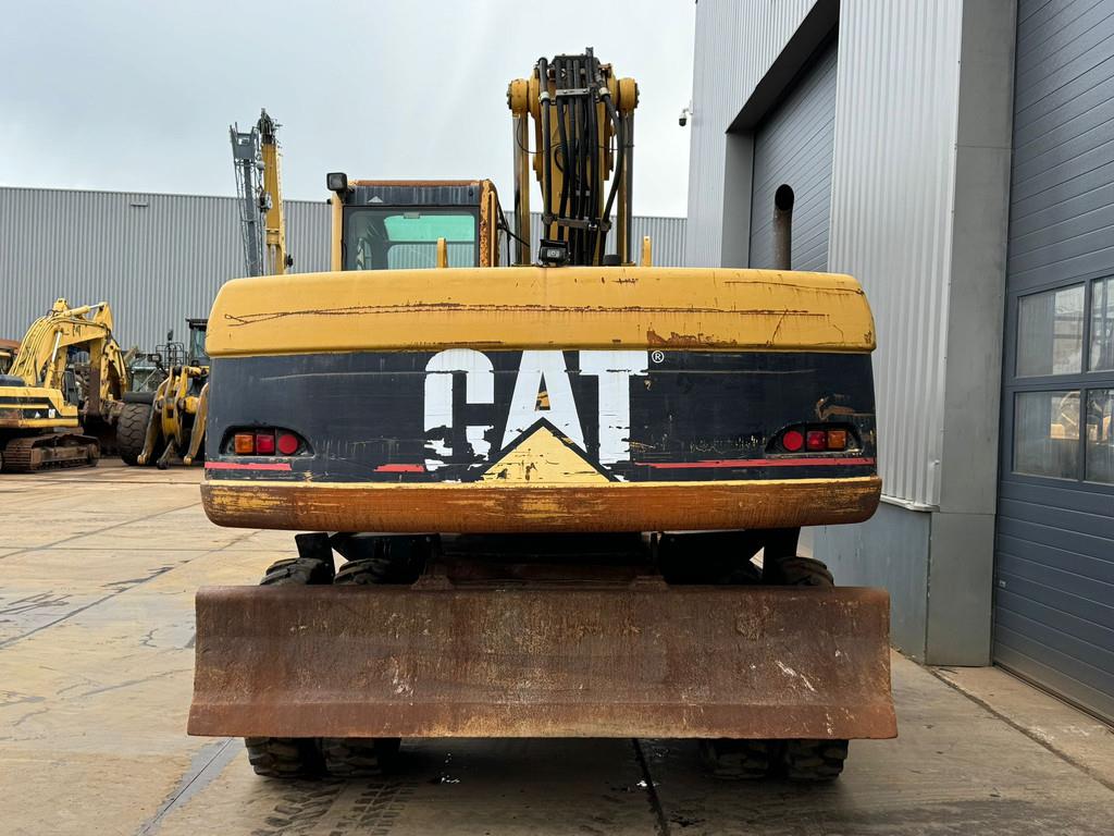 CAT M322C - Hydraulic stabilizers / VA Triple boom / C