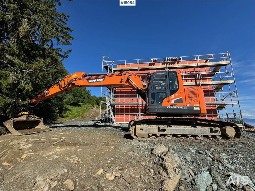 DX235LCR Tracked excavator w/ bucket and tilt.  Machineryscanner