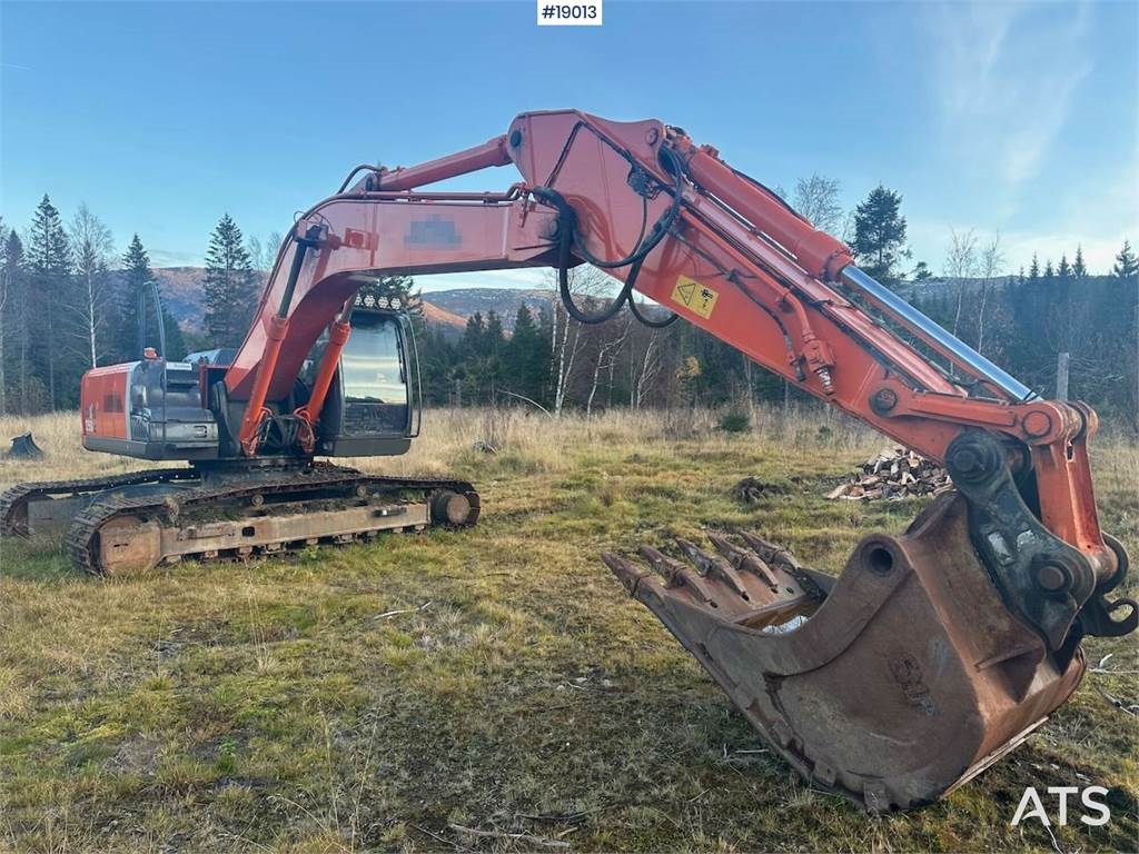 ZX250LC-3 excavator w/ new engine and 2 buckets. W  Machineryscanner