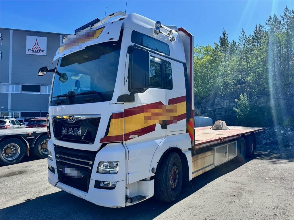 MAN TGX 580 Flatbed truck.