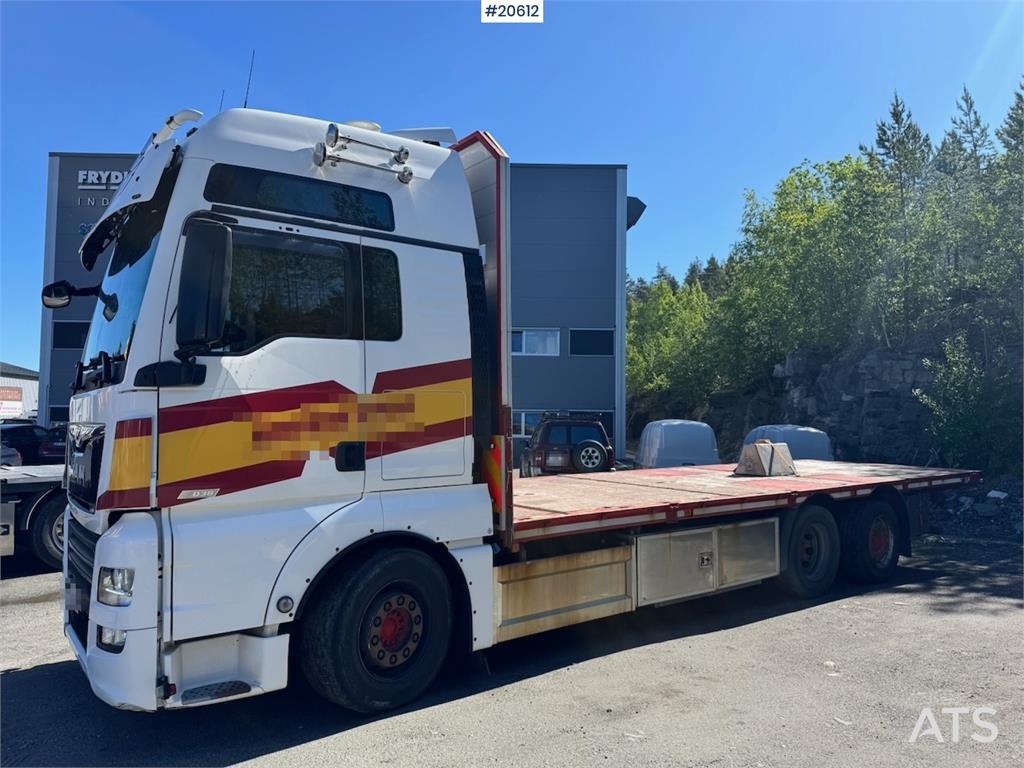 MAN TGX 580 Flatbed truck.