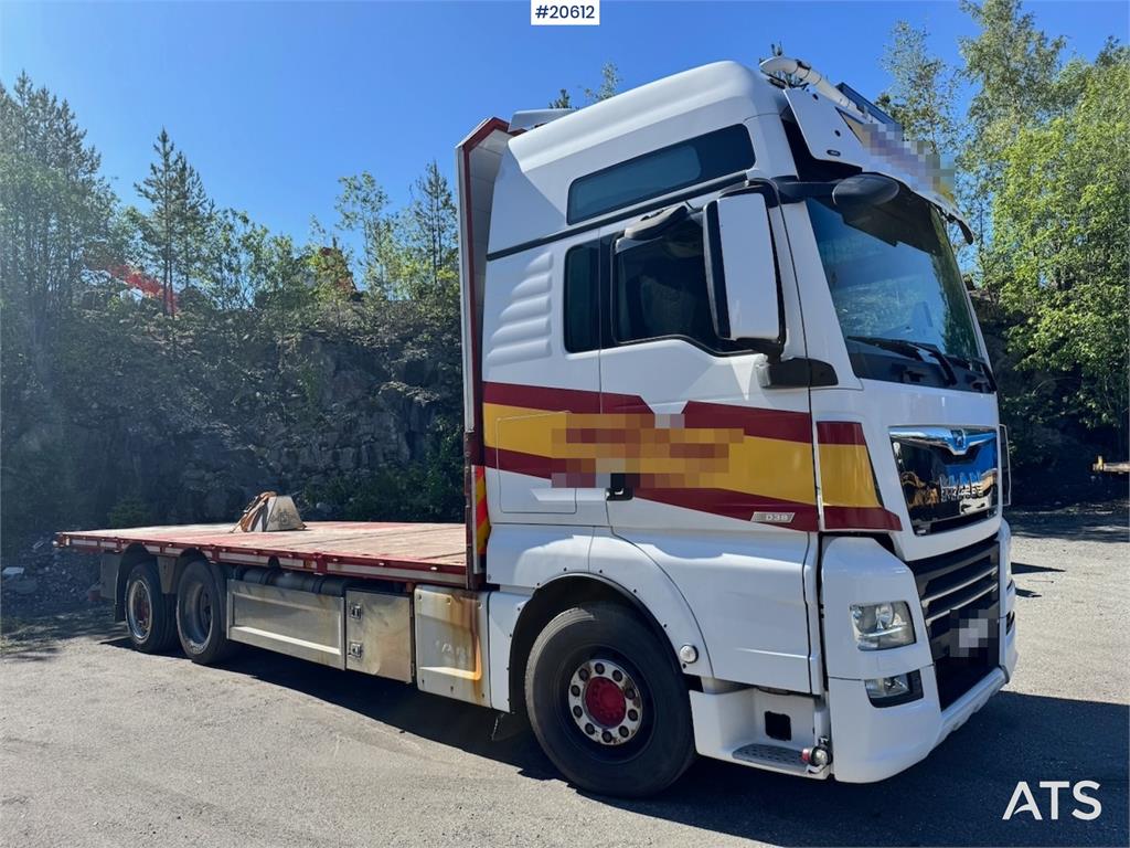 MAN TGX 580 Flatbed truck.