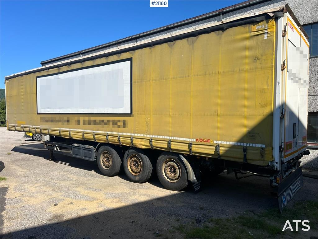 Kögel SN 24 3 axle trailer w/ full side opening on both