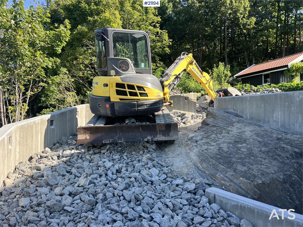 New Holland E55B excavator w/ digging bucket, sanding bucket,
