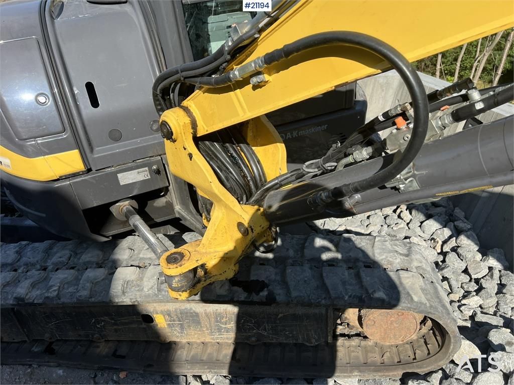 New Holland E55B excavator w/ digging bucket, sanding bucket,