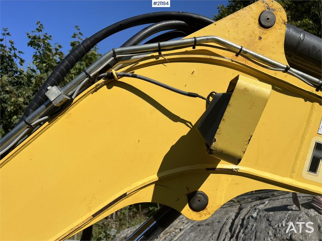 New Holland E55B excavator w/ digging bucket, sanding bucket,
