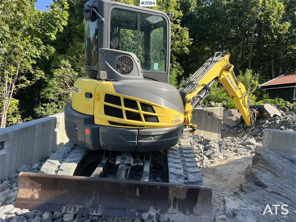 New Holland E55B excavator w/ digging bucket, sanding bucket,