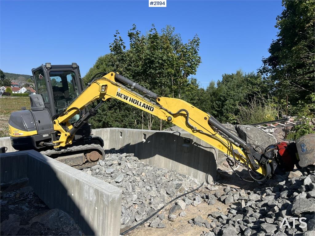 New Holland E55B excavator w/ digging bucket, sanding bucket,