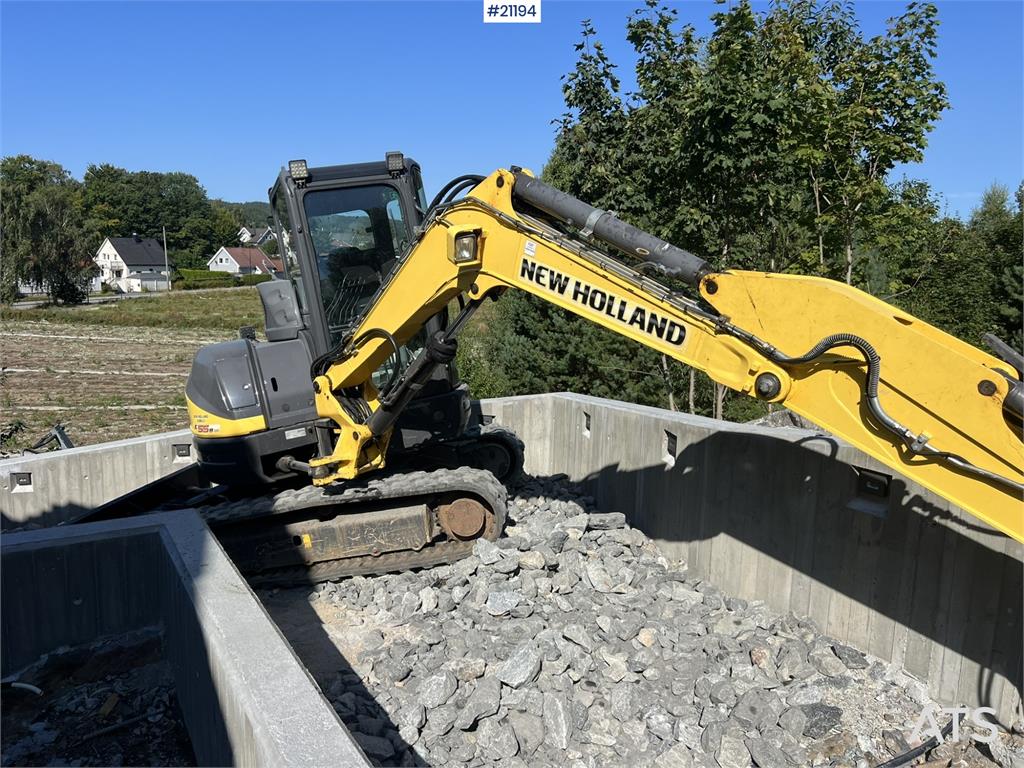 New Holland E55B excavator w/ digging bucket, sanding bucket,