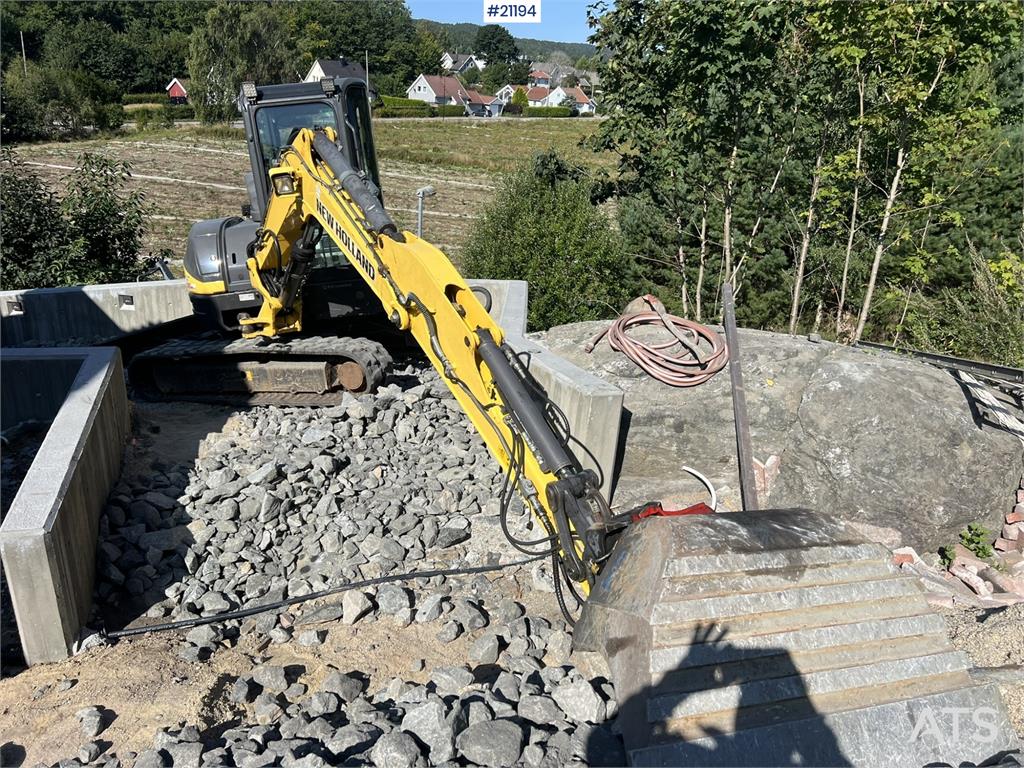 New Holland E55B excavator w/ digging bucket, sanding bucket,