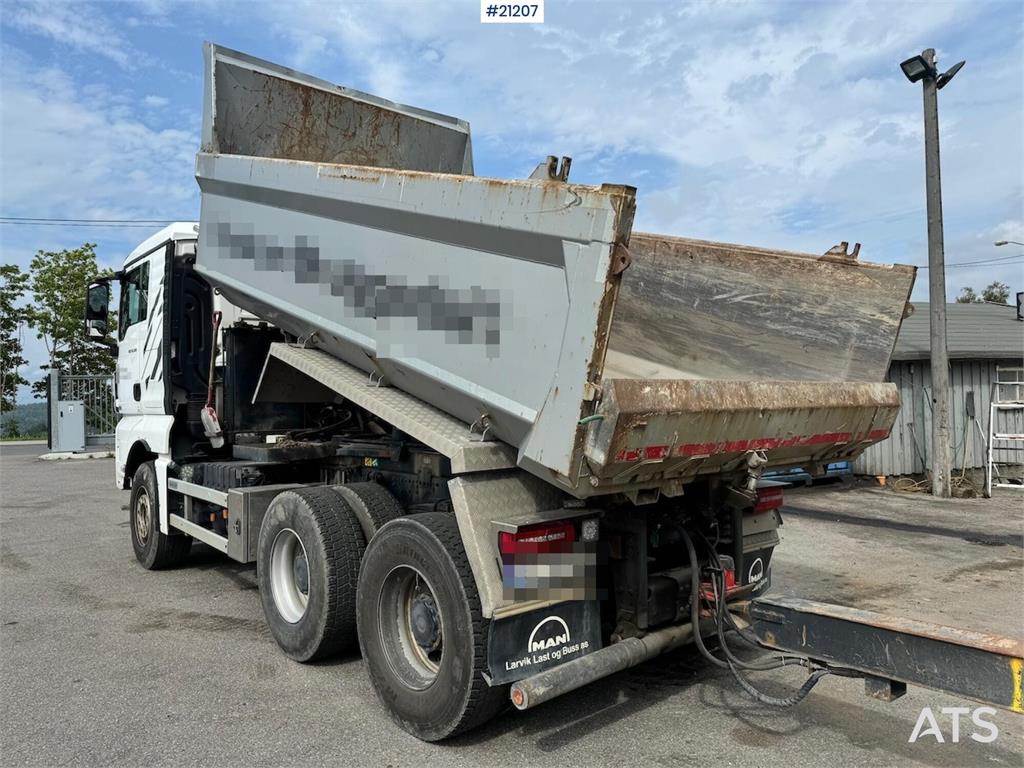 MAN TGX 26.580 6x4 snow rigged tipper truck.
