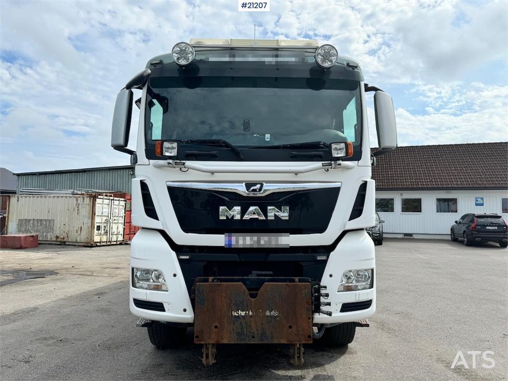 MAN TGX 26.580 6x4 snow rigged tipper truck.
