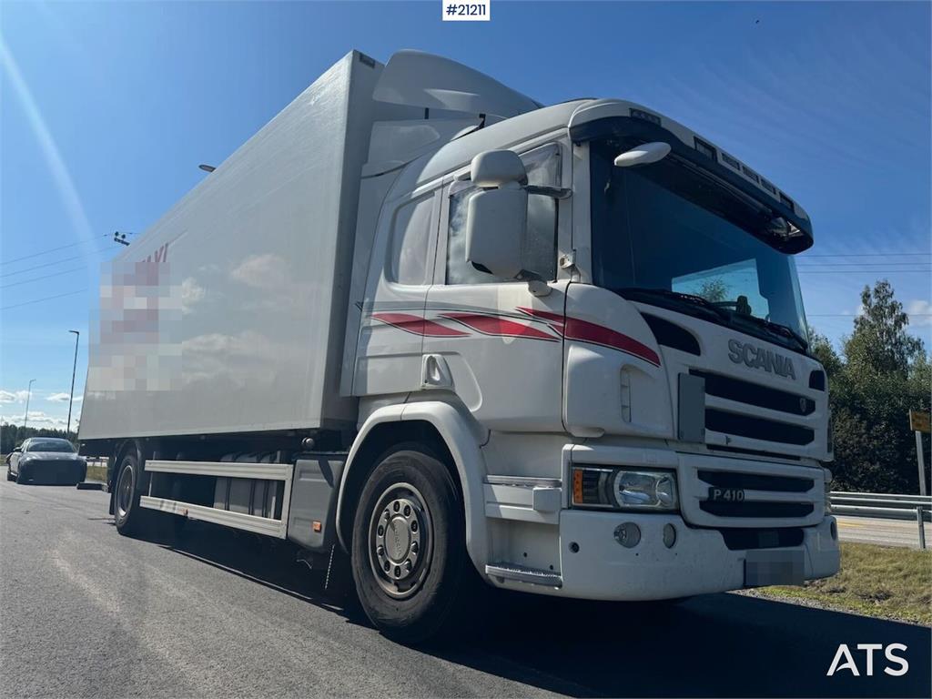 Scania P410 4x2 Box truck w/ full side opening and lift.