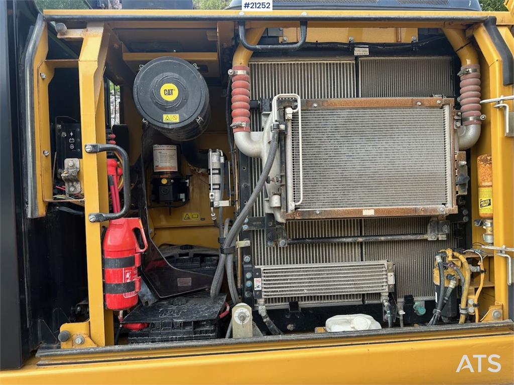 CAT 323E excavator w/ 3 buckets.