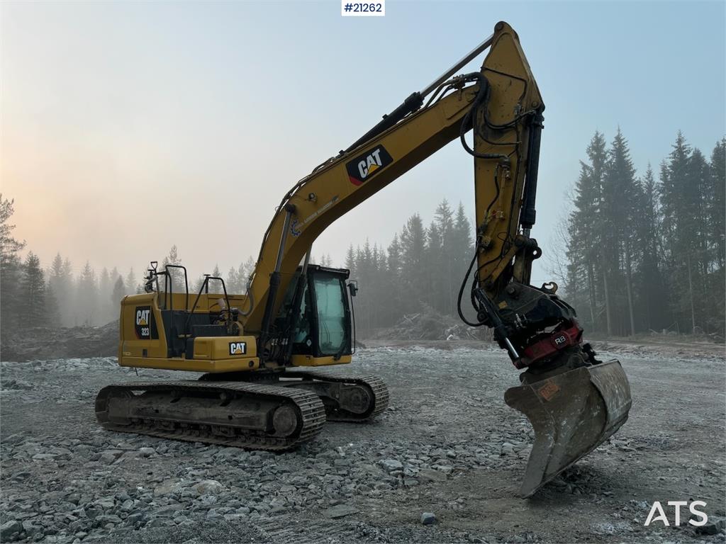 CAT 323