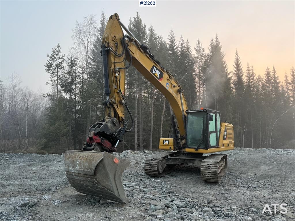 CAT 323