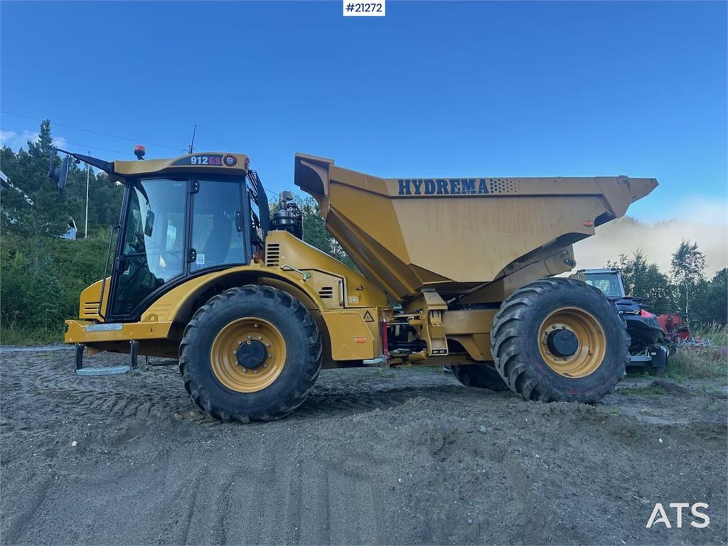 Hydrema 912GS dump truck w/white signs. WATCH VIDEO.