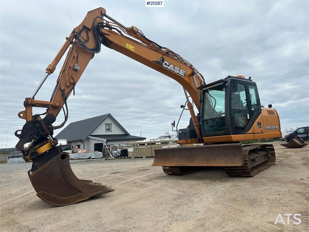 CASE CX130B excavator w/rototilt and two buckets. WATCH