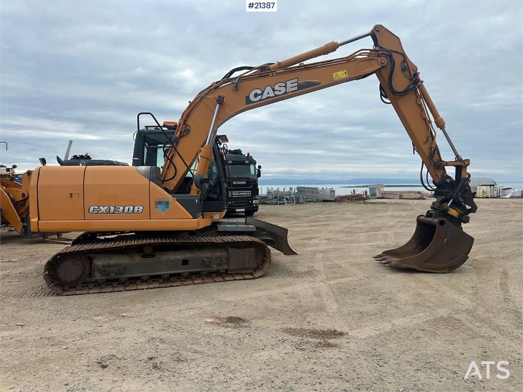 CASE CX130B excavator w/rototilt and two buckets. WATCH