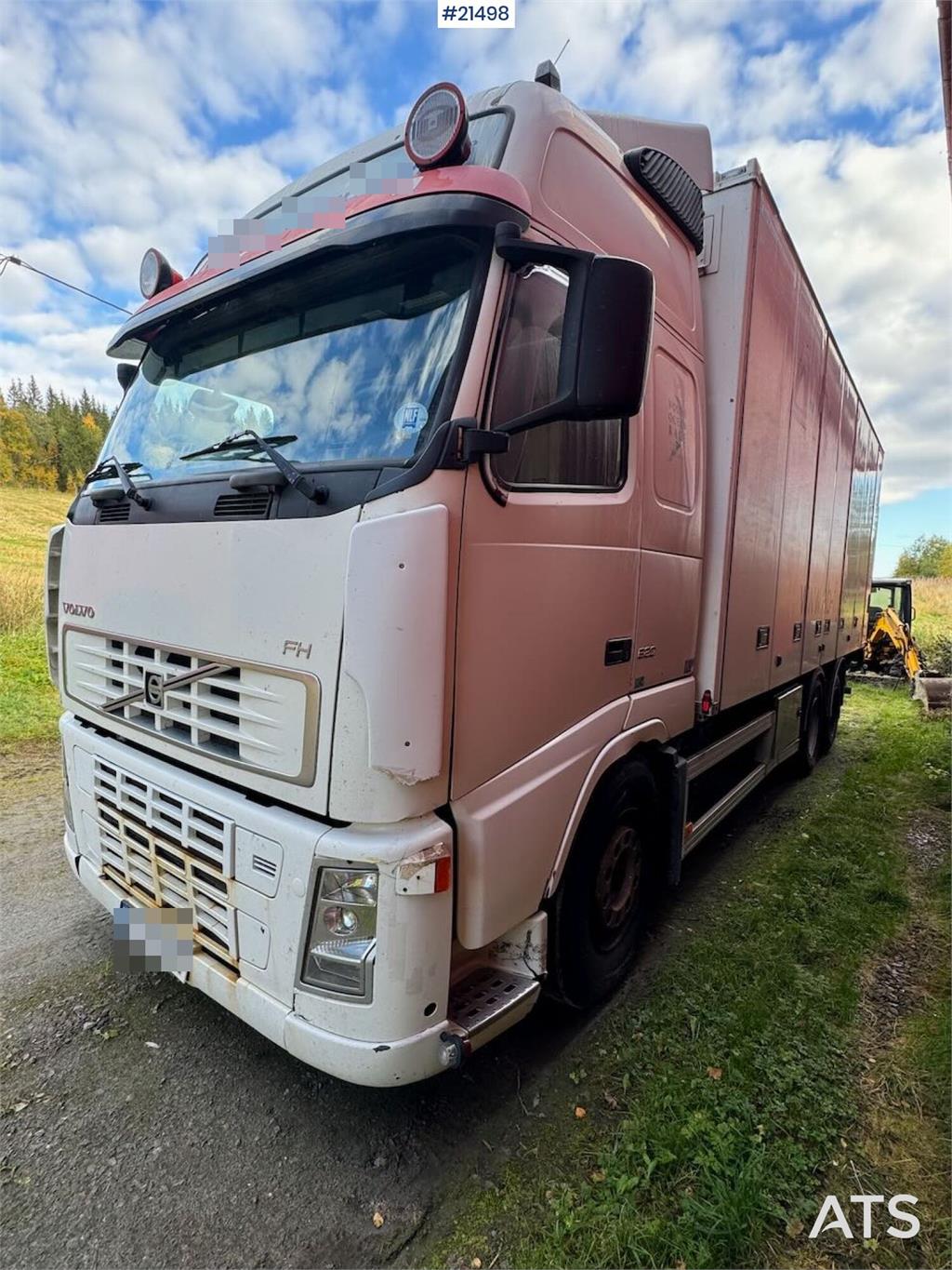 Volvo Fh520 6x2 box truck w/ full side opening and lift.