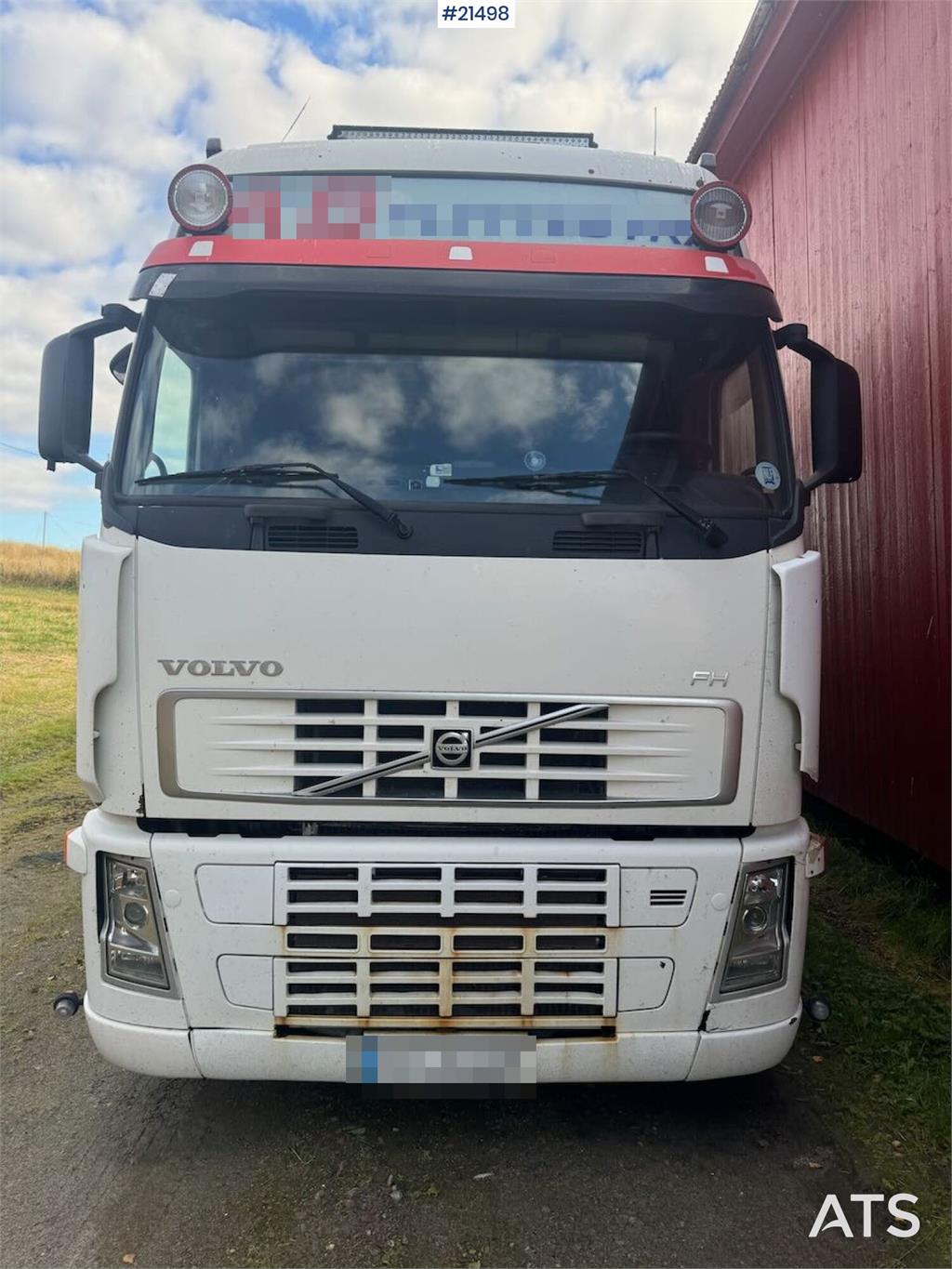 Volvo Fh520 6x2 box truck w/ full side opening and lift.