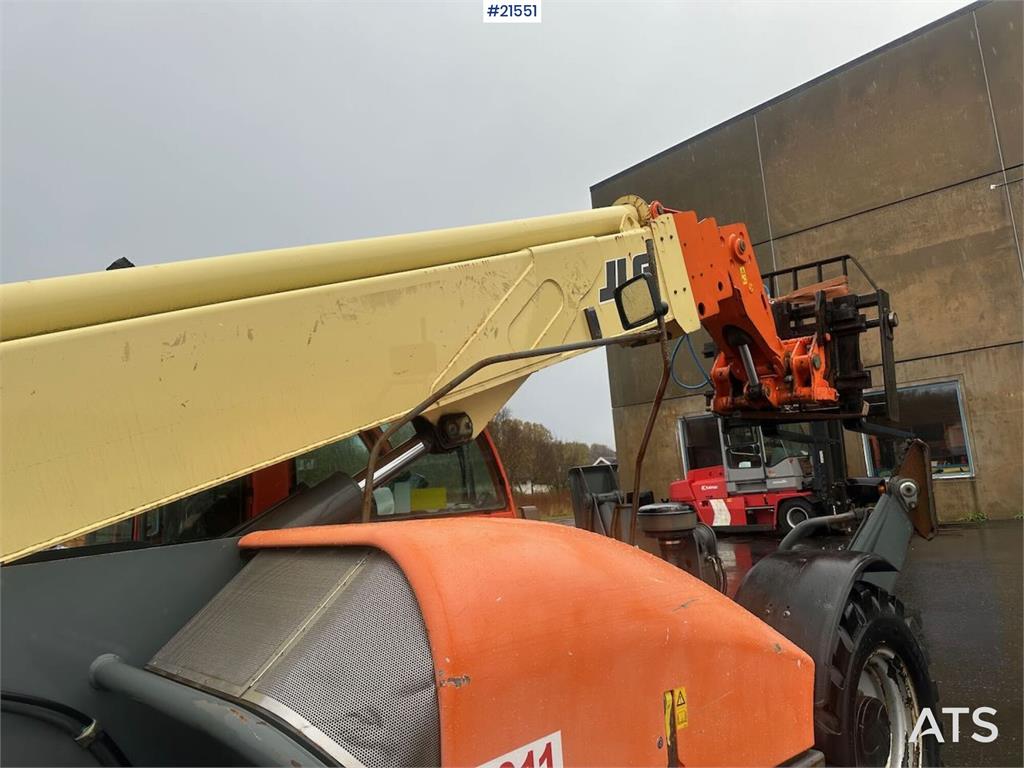 JLG 4017 telehandler w/ two pallet forks and bucket. C