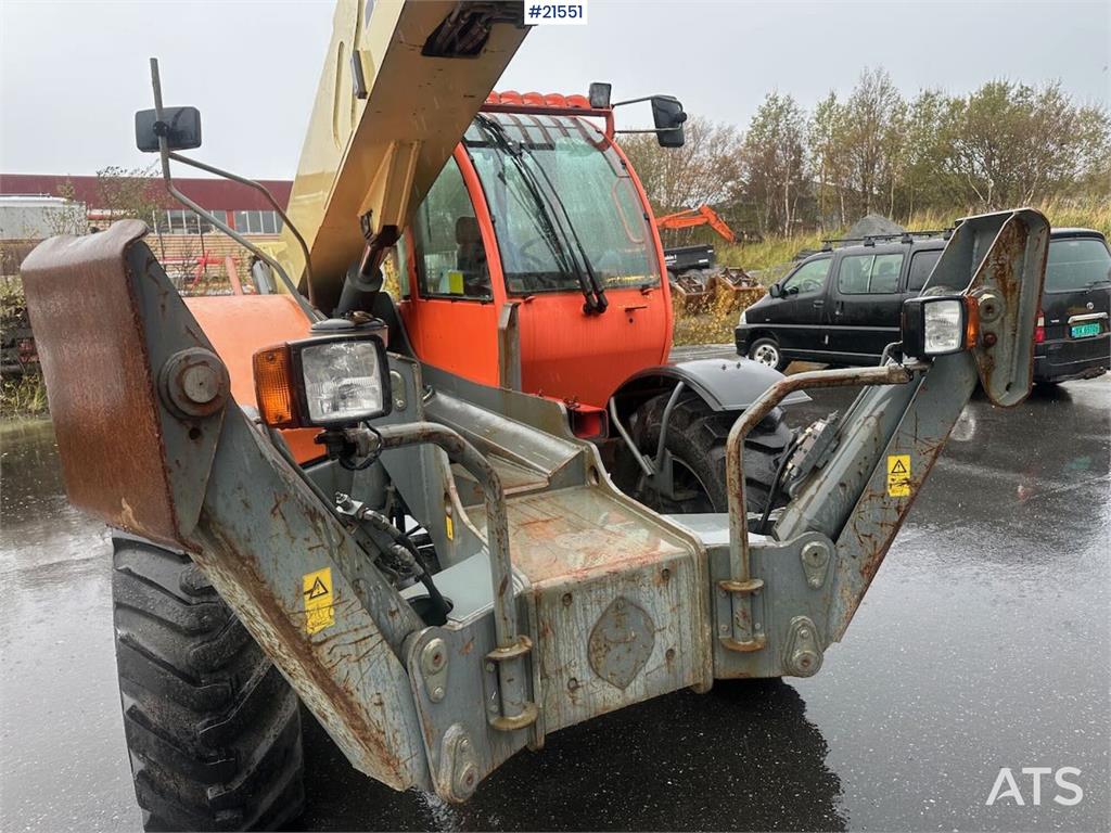 JLG 4017 telehandler w/ two pallet forks and bucket. C