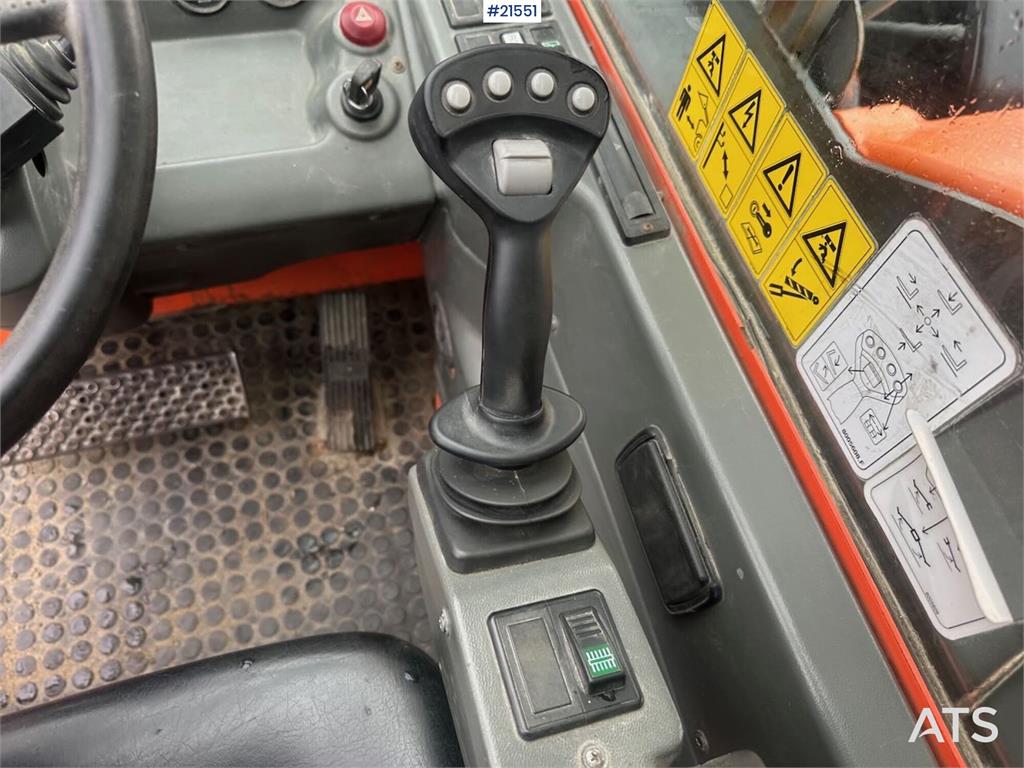 JLG 4017 telehandler w/ two pallet forks and bucket. C