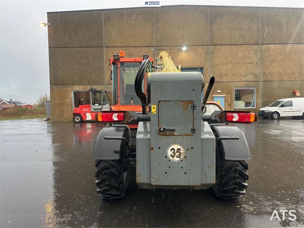JLG 4017 telehandler w/ two pallet forks and bucket. C